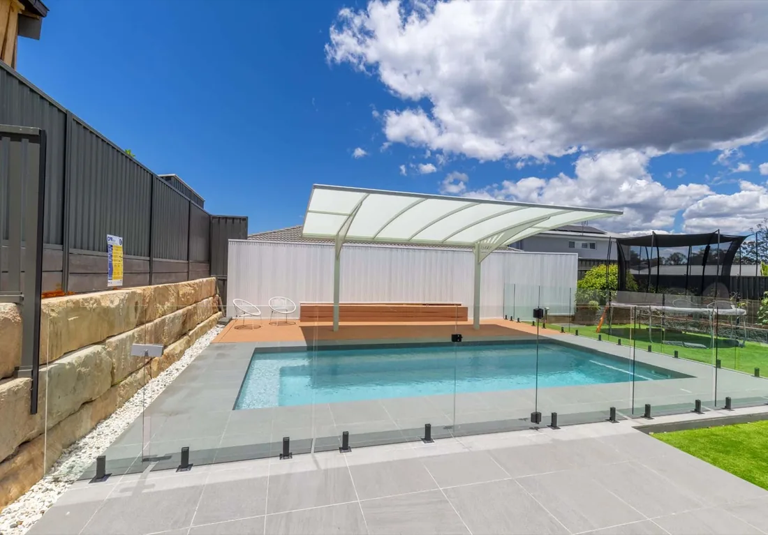 A Entertainer 7 fibreglass pool in Quartz Grey