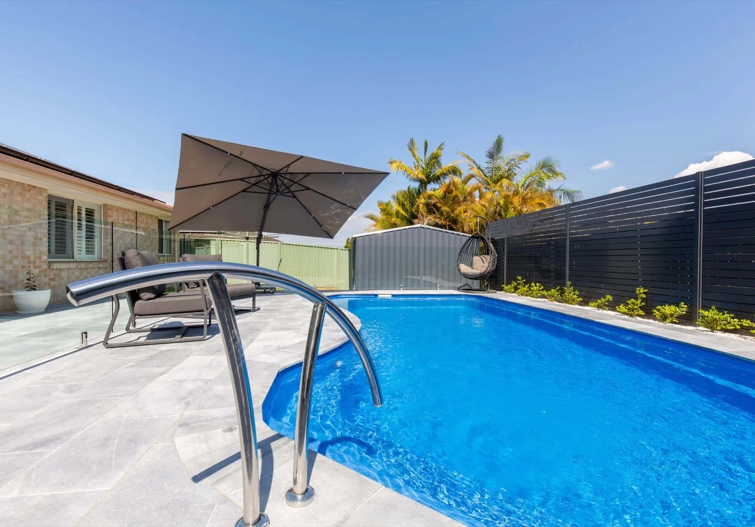 A Belmont fibreglass pool in Crystal Sapphire