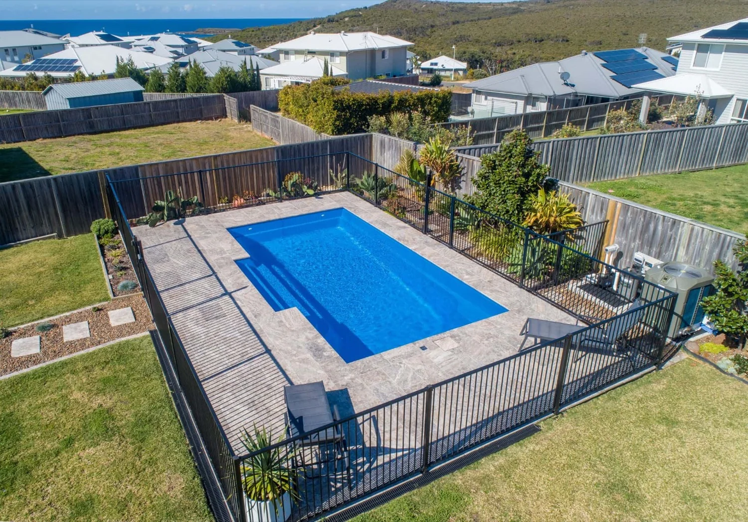 A Cosmo fibreglass pool in Crystal Sapphire