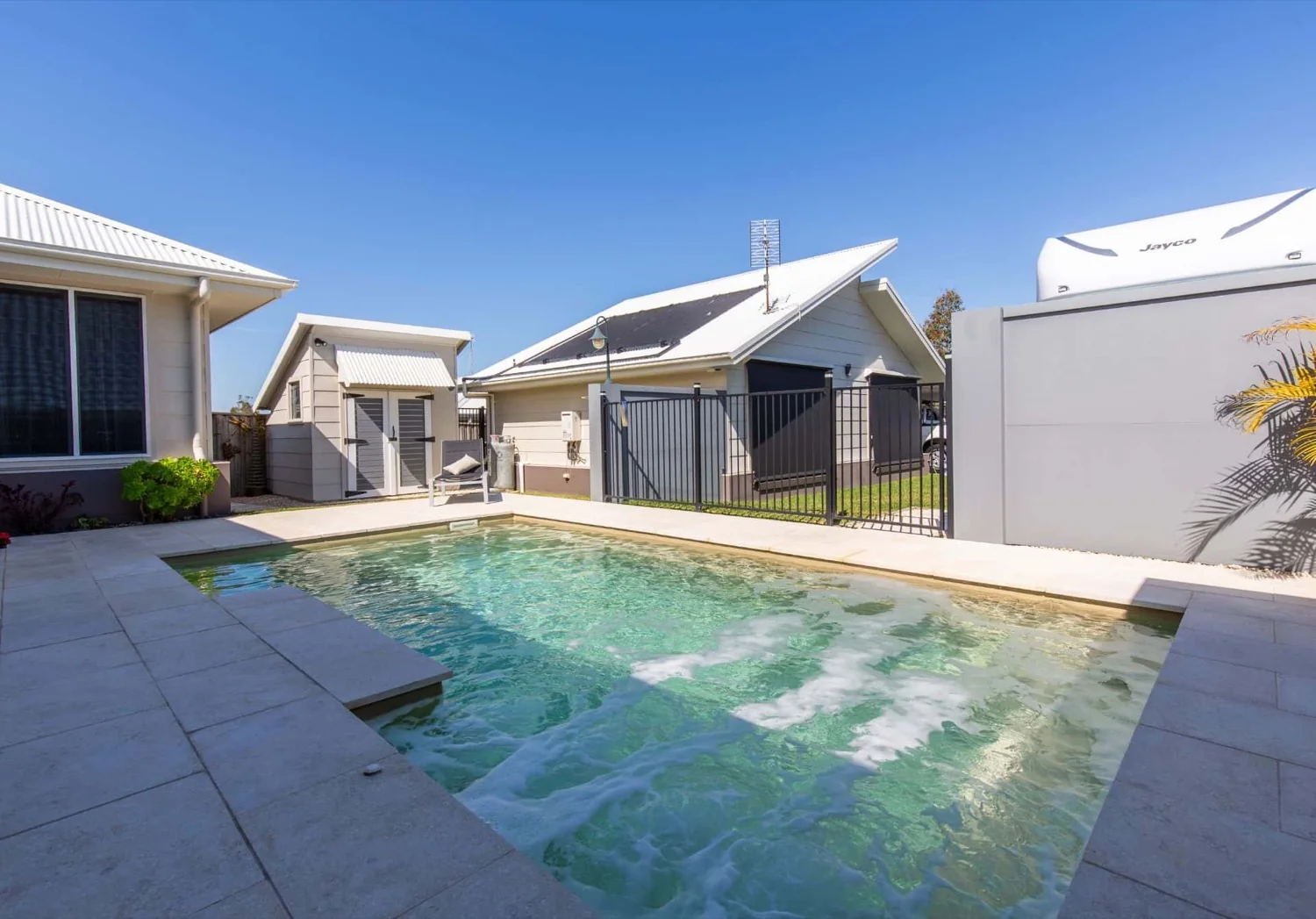 A Resort fibreglass pool in Beach Sand